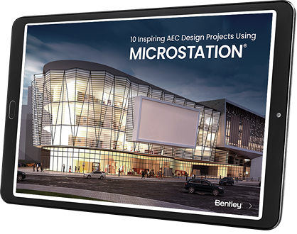 A tablet displaying a screen with a cover image of a modern architectural building and the text "10 Inspiring AEC Design Projects Using MicroStation by Bentley" showcases how visions become reality through innovative design. | Bentley Systems | Infrastructure Engineering Software Company A tablet displaying a screen with a cover image of a modern architectural building and the text "10 Inspiring AEC Design Projects Using MicroStation by Bentley" showcases how visions become reality through innovative design.